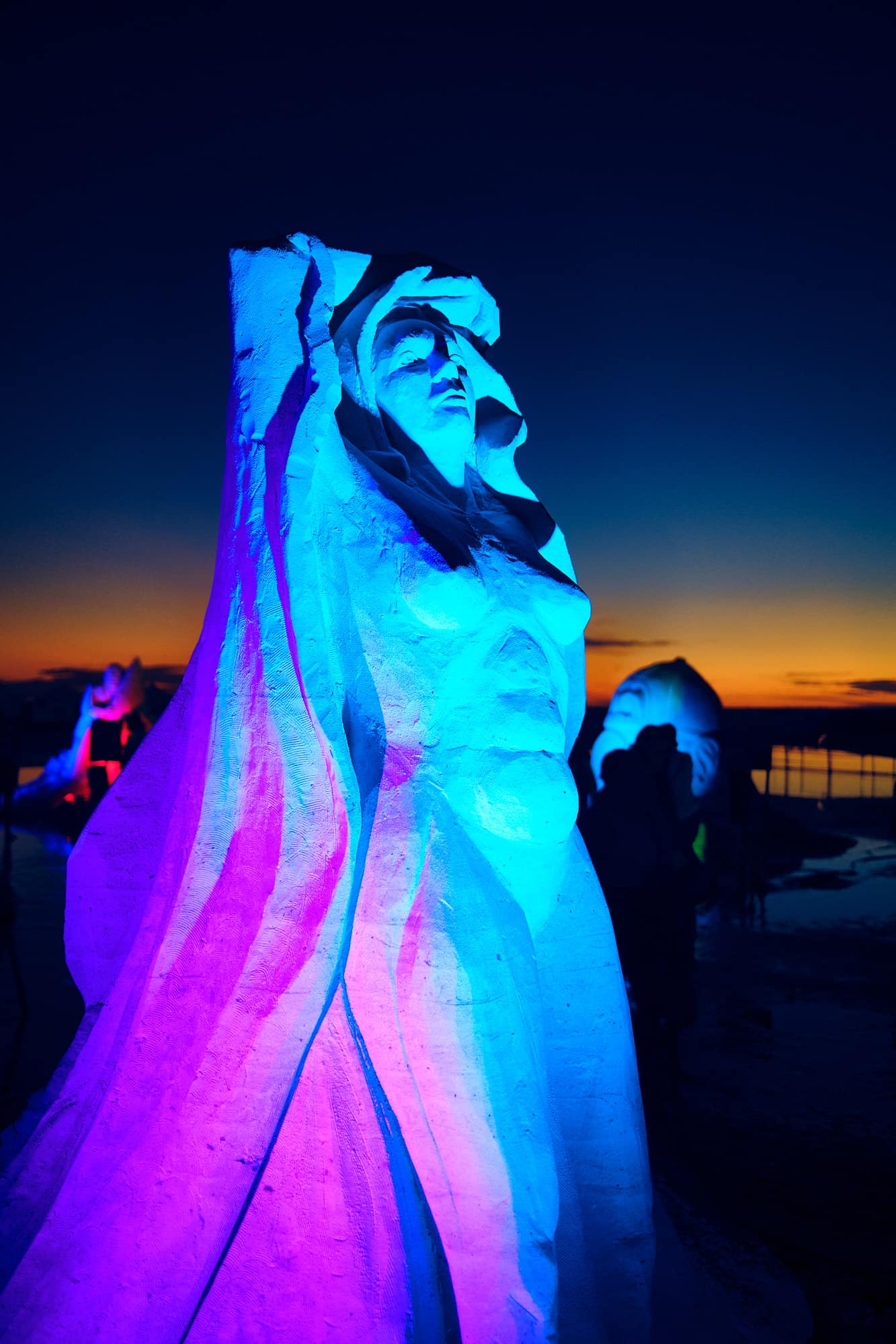 Sand Sculptures lit up and looking magical at The 2022 Siesta Key