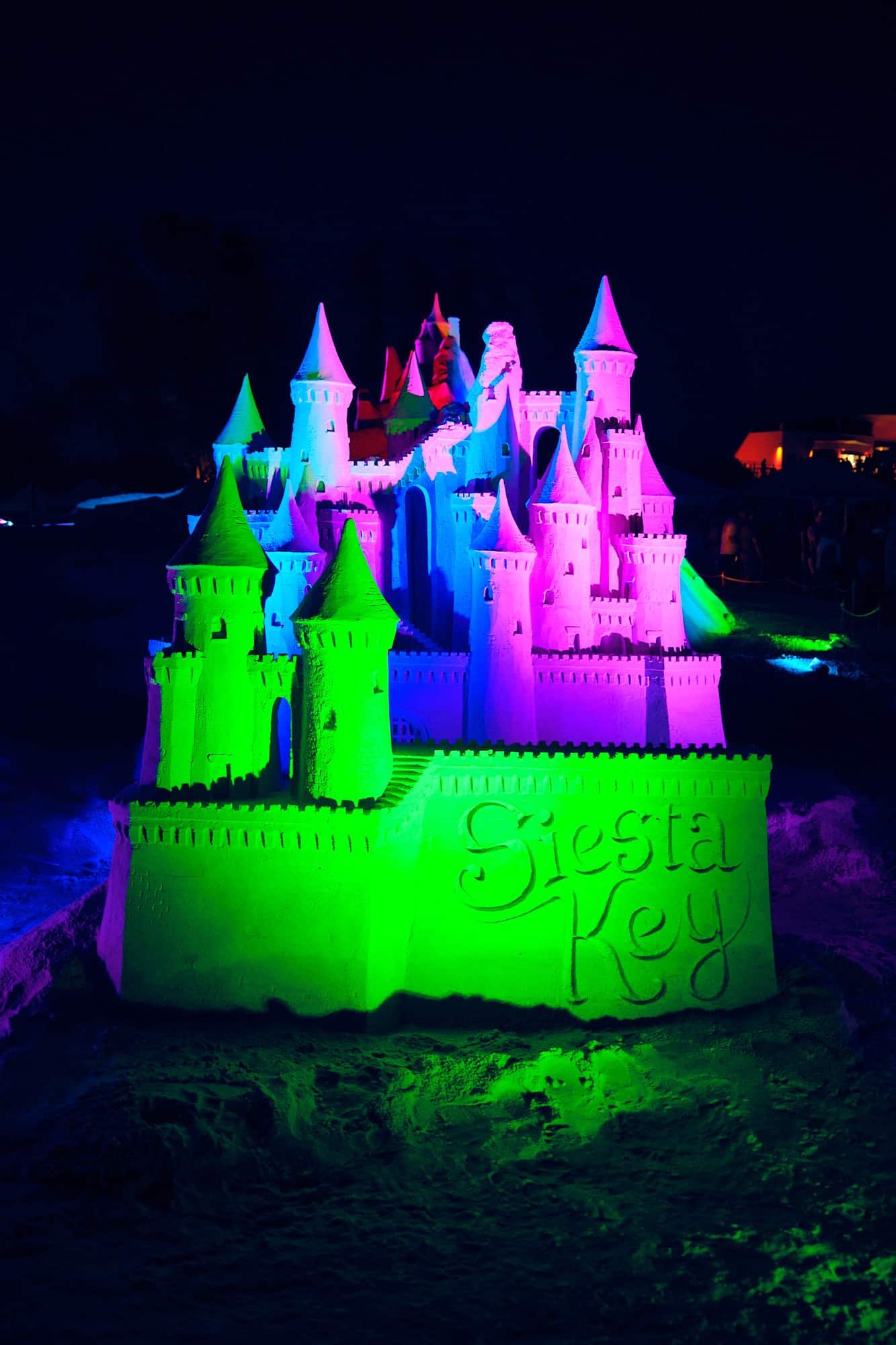 Sand Sculptures lit up and looking magical at The 2022 Siesta Key