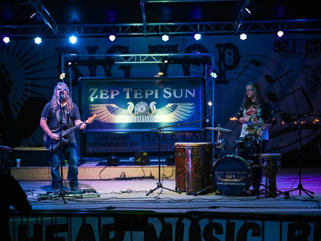 Event photography of band performing live on stage in Sarasota