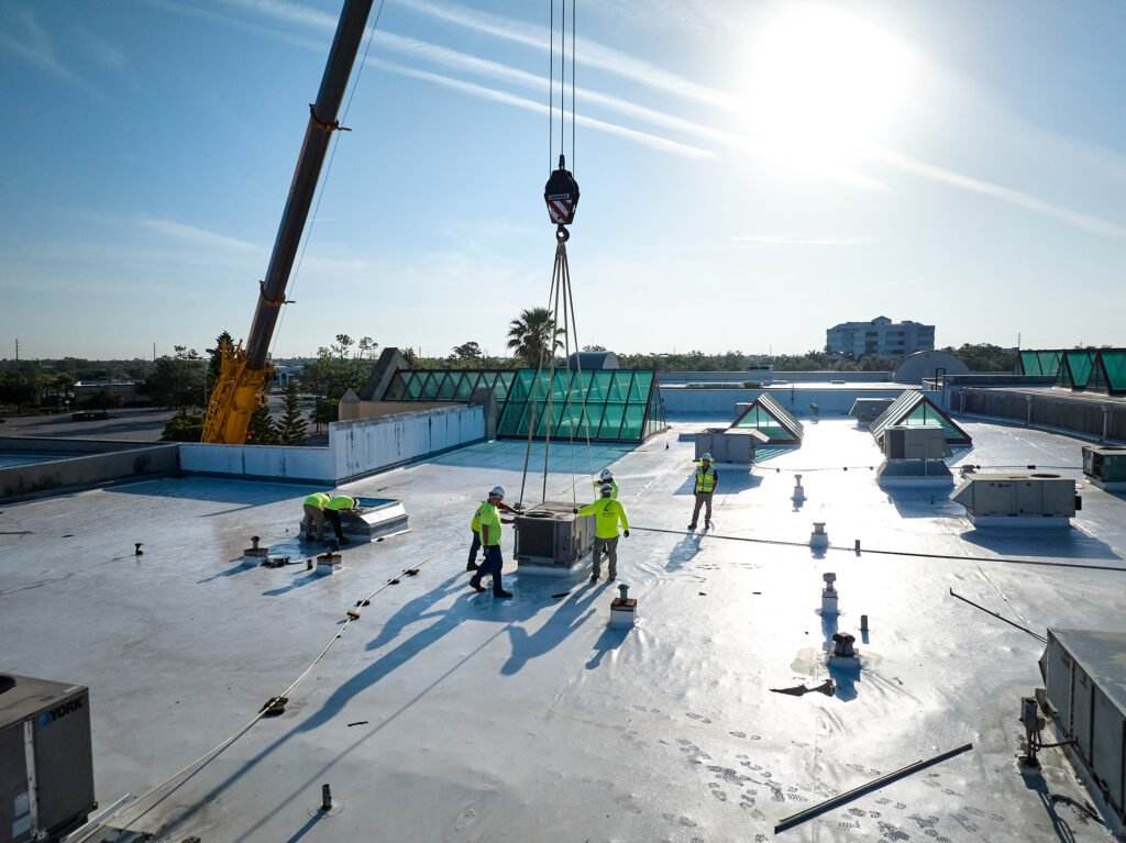 Commercial Business Aerial Photography Sarasota Men Working on Roof Repair