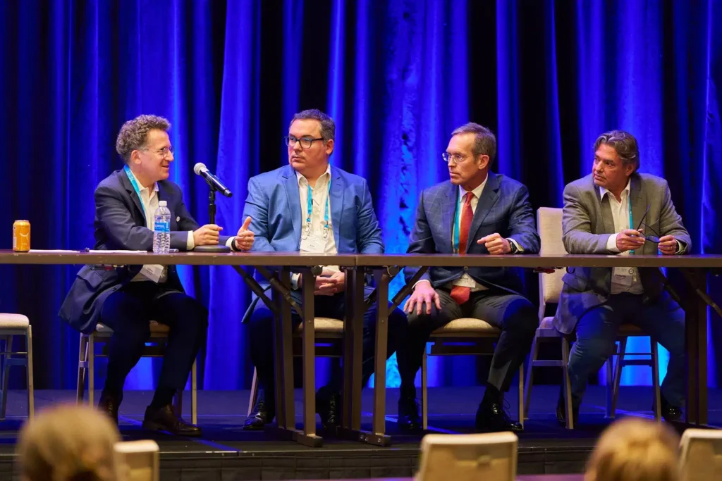 Panel discussion photo with experts at medical conference in Sarasota