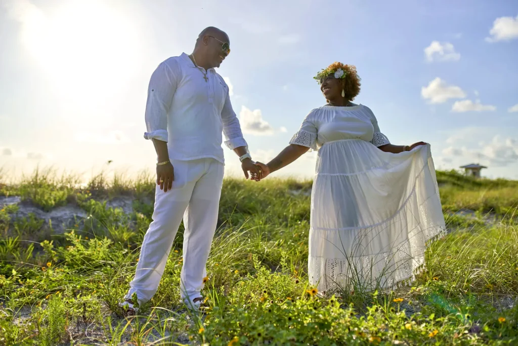 Engagement photography portrait session with happy couple in the sun