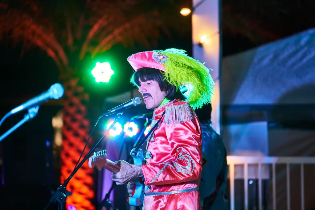 Event Photo of the Beatles cover band musician performing for a live concert