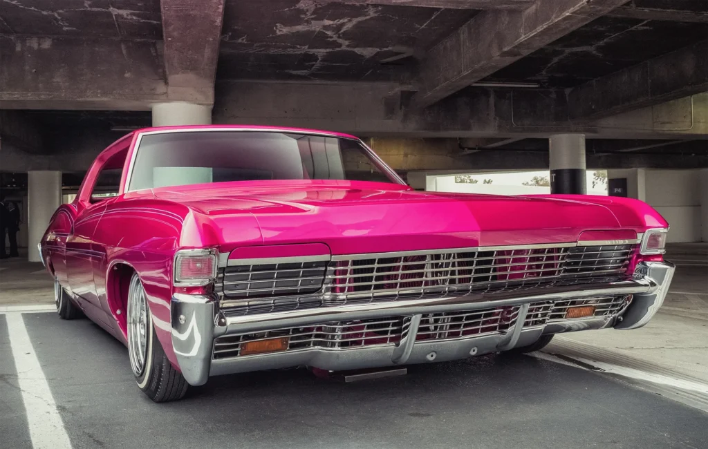 Pink Lowrider Automotive Photographer Classic Car in Parking Garage