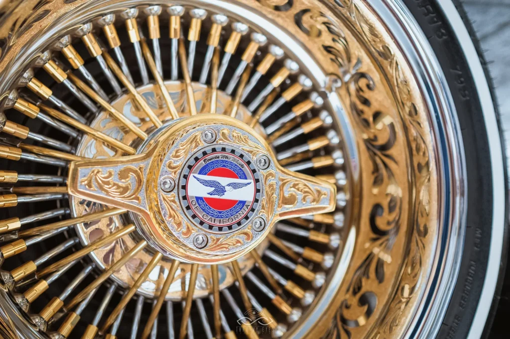 Professional automotive photography Sarasota Ornate gold-plated classic car hubcap