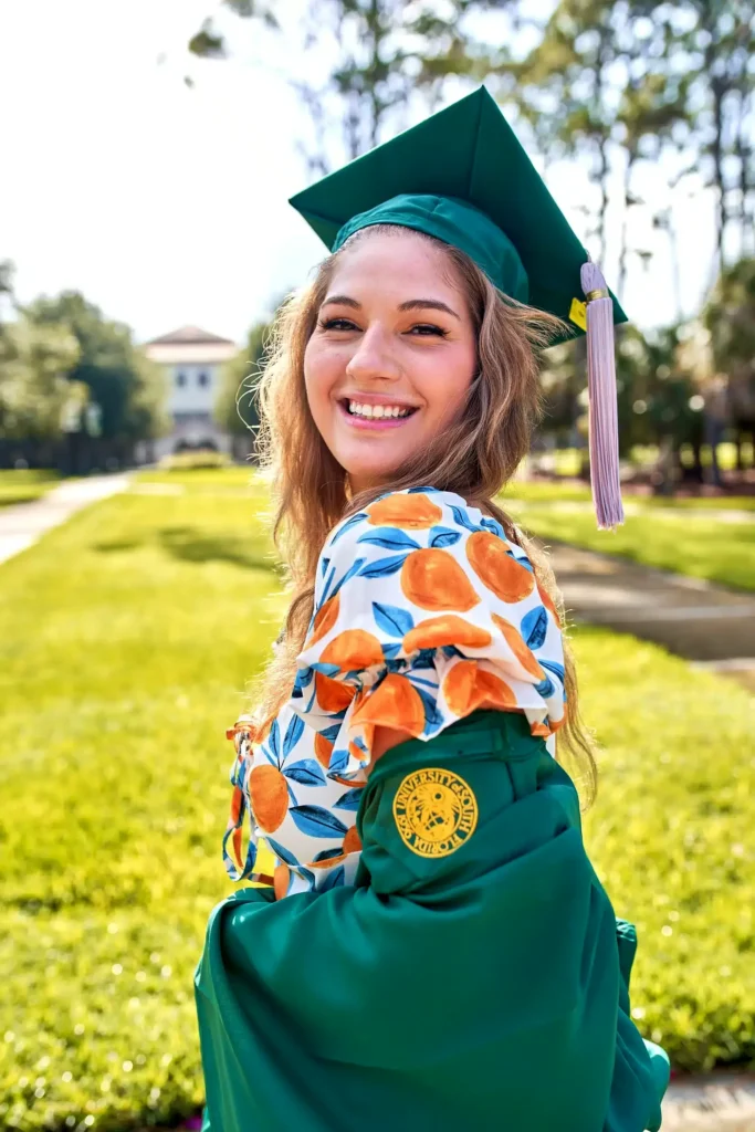 Portrait of Florida college graduate smiling for her graduation photos
