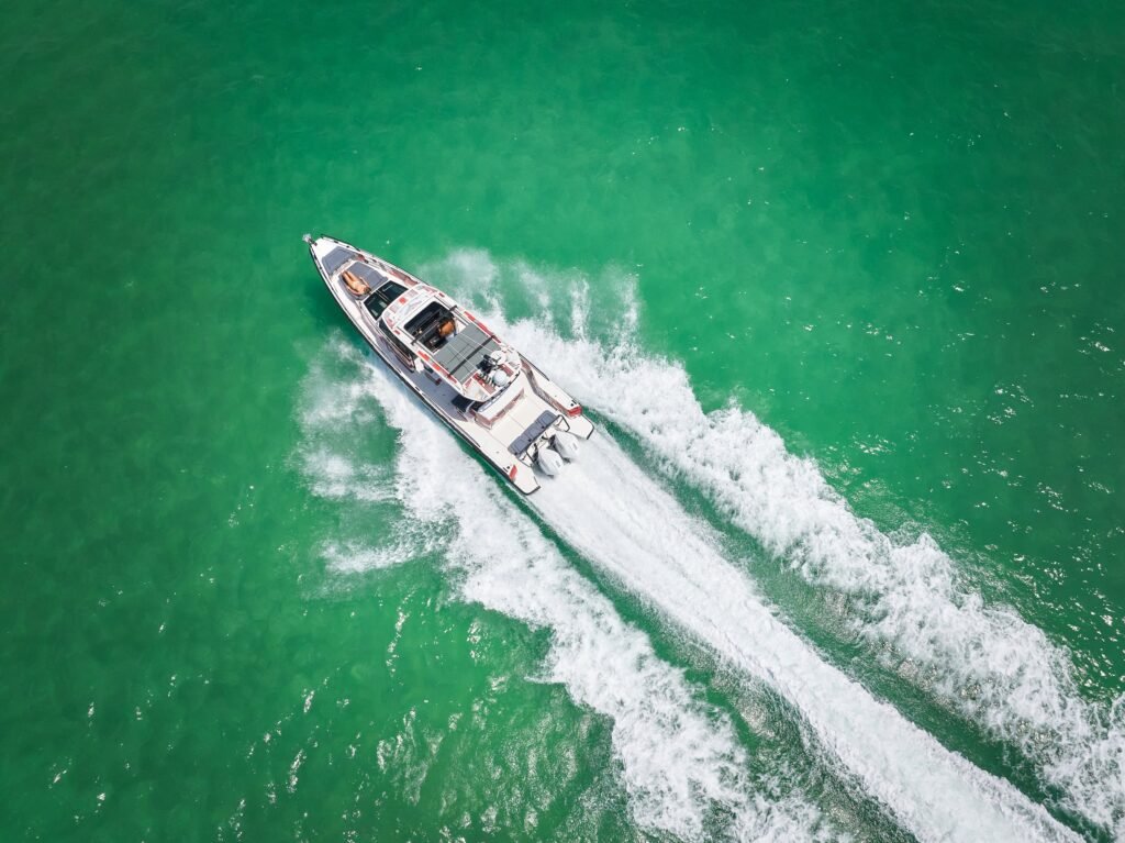 Drone Photograph of Speed Boat in Sarasota Waves Water Splashing