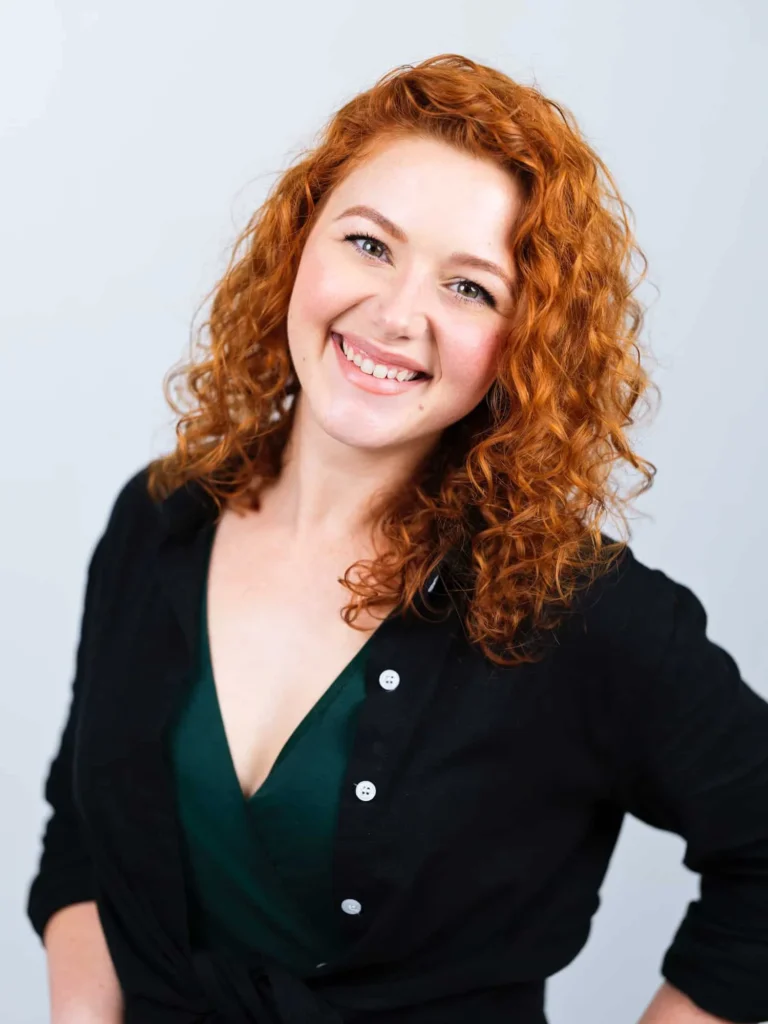 Young woman smiling for studio portrait headshot photography session