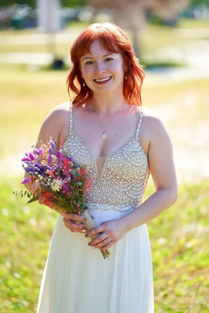 Portrait photography of bride on wedding day with flower bouquet