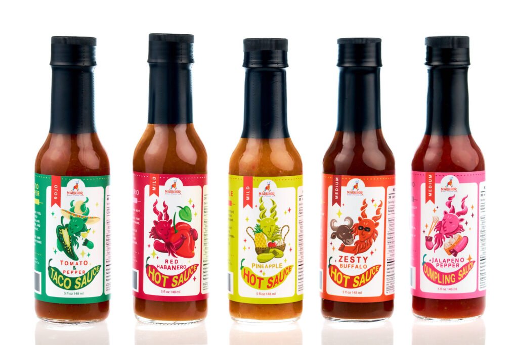 Product Photography on White of Hot Sauce Bottles