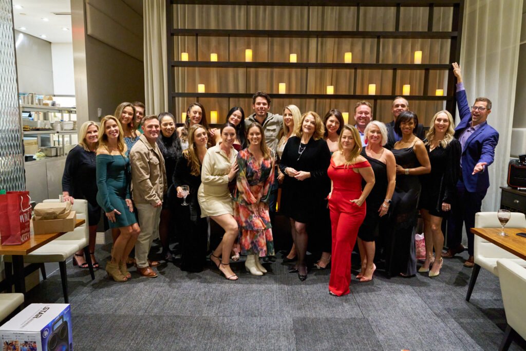 Large group photo at corporate holiday party in Sarasota