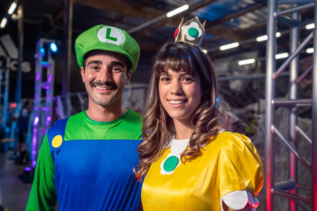 Event portrait of couple at party dressed in costumes