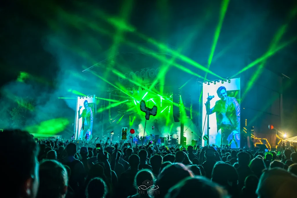 Live concert photography of the Killers performing on stage at Bonnaroo