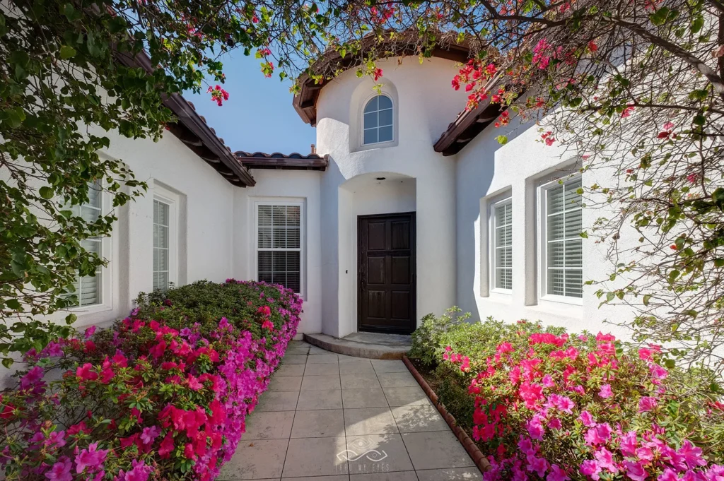 sarasota-real-estate-flower-entrance-001 Real Estate Photographer Home Exterior with Flowers Sarasota Luxury Listings