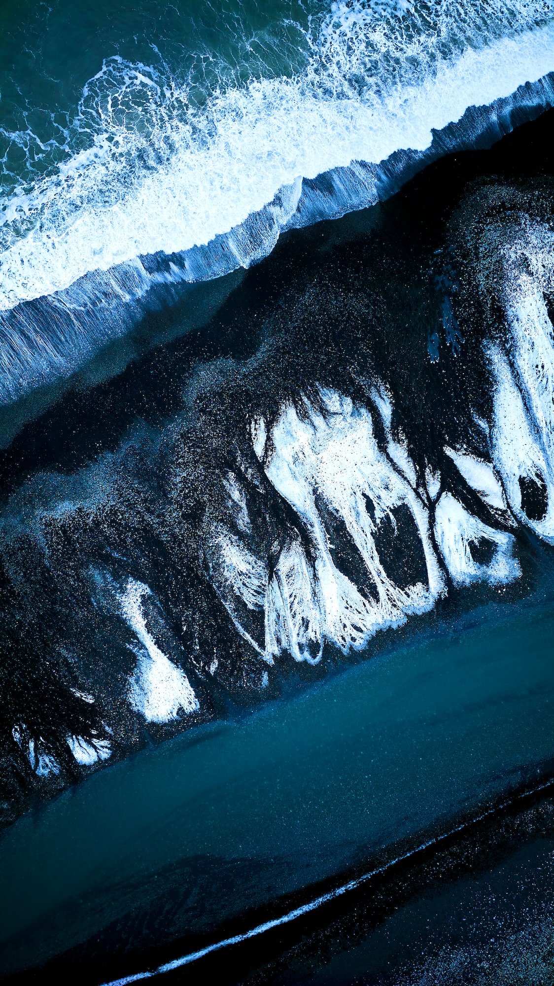 Aerial Drone Photography Landscape black sand beach at Reynisfjara Beach, Iceland
